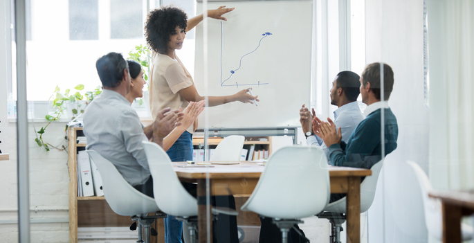 Cropped shot of a group of business colleagues meeting in the boardroom