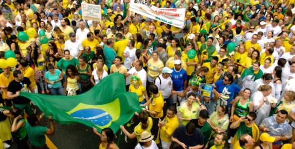 BrazilProtests protestors waving brazilian flags