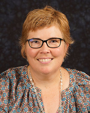 Carrie Plummer headshot, smiling