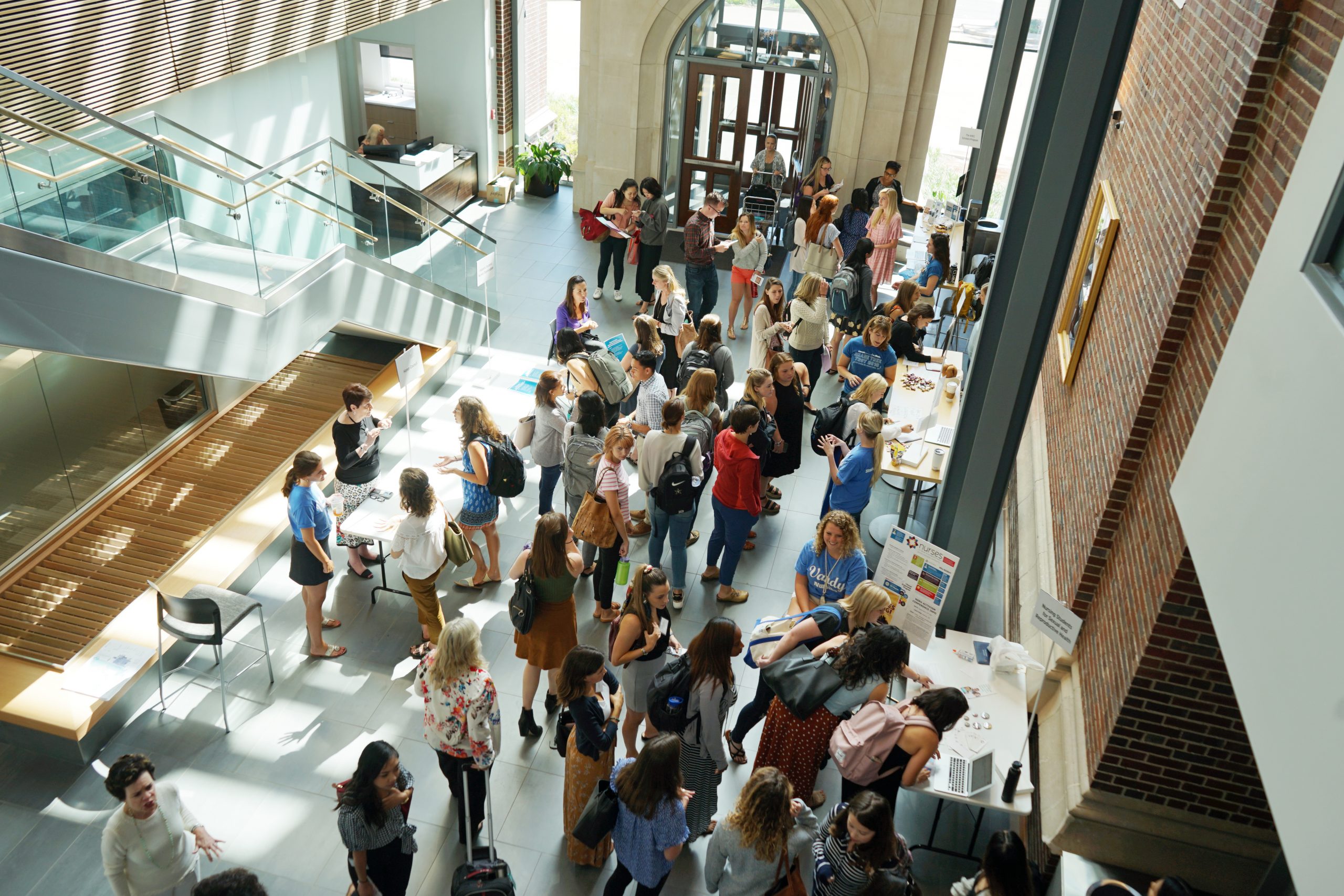 Two professional women walking up stairs
