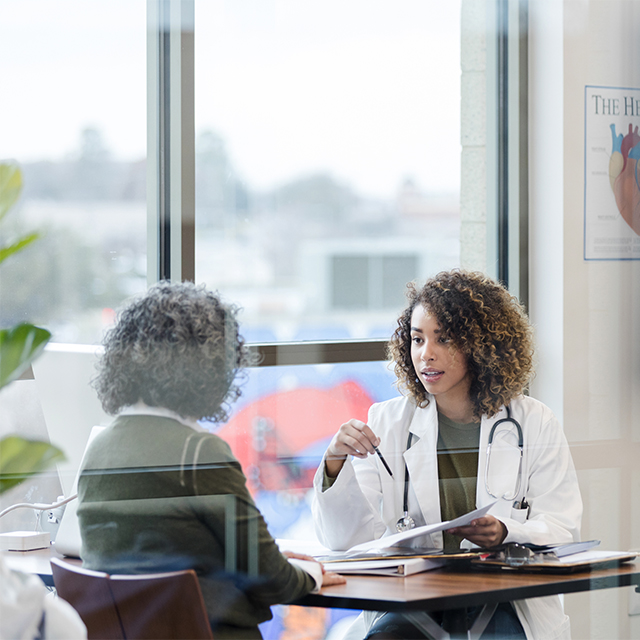 Doctor talking to patient about treatment