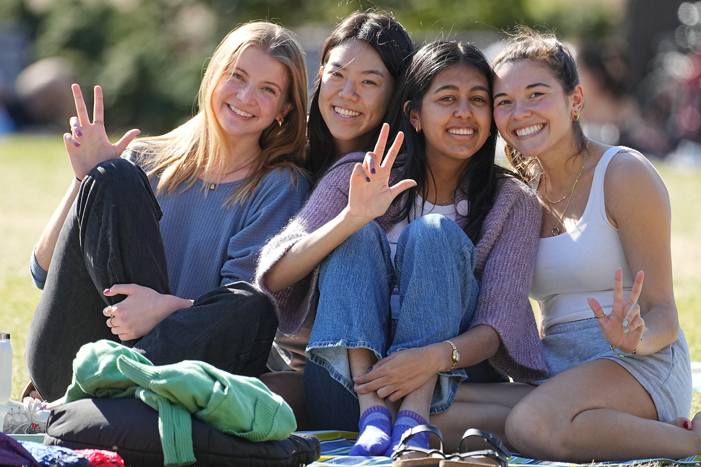 students sitting on vanderbilt lawn