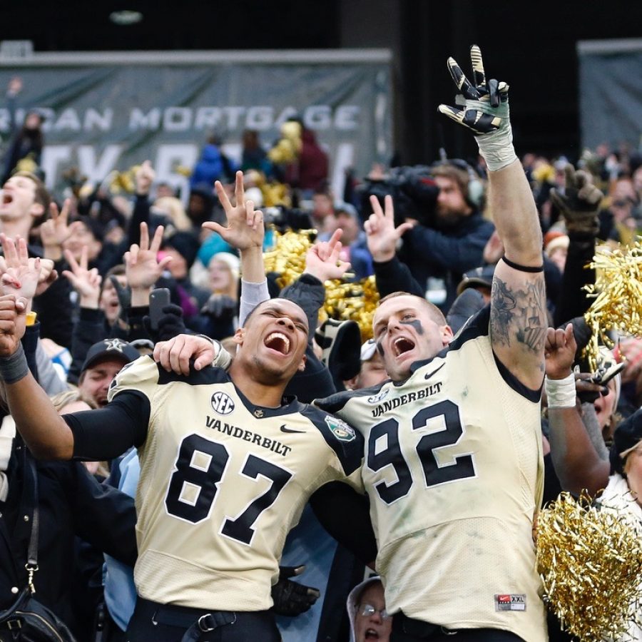 Football players celebrating.