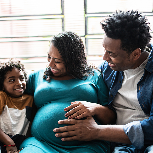 Pregnant family celebrating