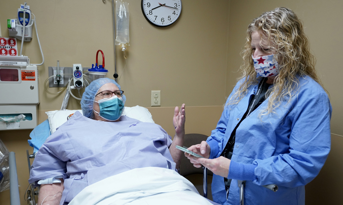 Barbara Beeson, RN, works with patient Cheryl Binford at last week’s Vanderbilt Ortho-paedics Outreach Day.