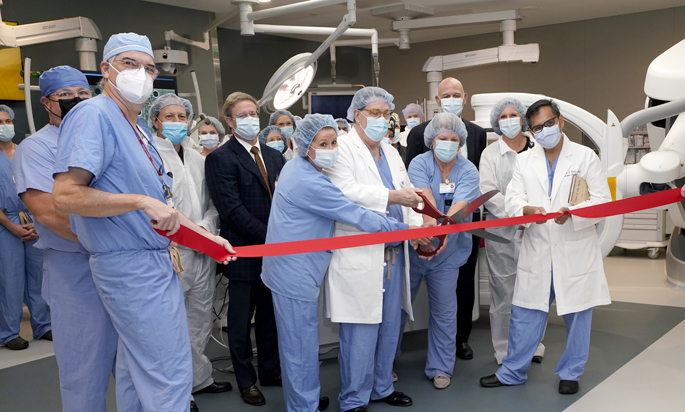 Officials cut the ribbon at last week’s dedication of VUMC’s new hybrid operating rooms. 