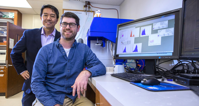 Young Kim, MD, PhD, left, Michael Korrer, PhD, and colleagues are studying a potential new cancer immunotherapy option.