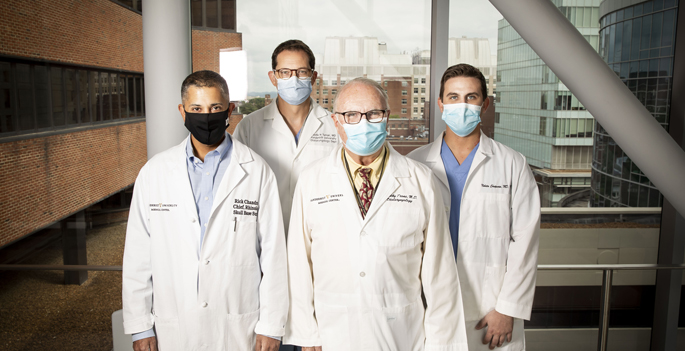 The team studying smell and taste loss associated with COVID-19 includes, from left, Rakesh Chandra, MD, Justin Turner, MD, Timothy Trone, MD, and Nikita Chapurin, MD, MHS.