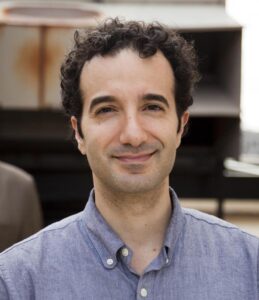 Headshot of Prof Abumrad