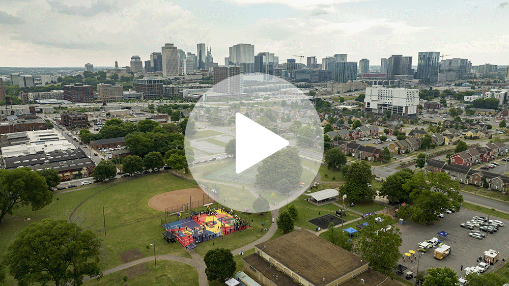 Aerial view of Perry Wallace memorial HOPE mural on the outdoor basketball court at Watkins Park, video play button