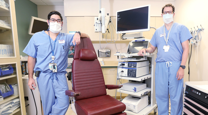 Kyle Kimura, MD, left, Justin Turner, MD, PhD, and colleagues are studying whether nasal saline irrigations can reduce symptoms in patients with COVID-19.