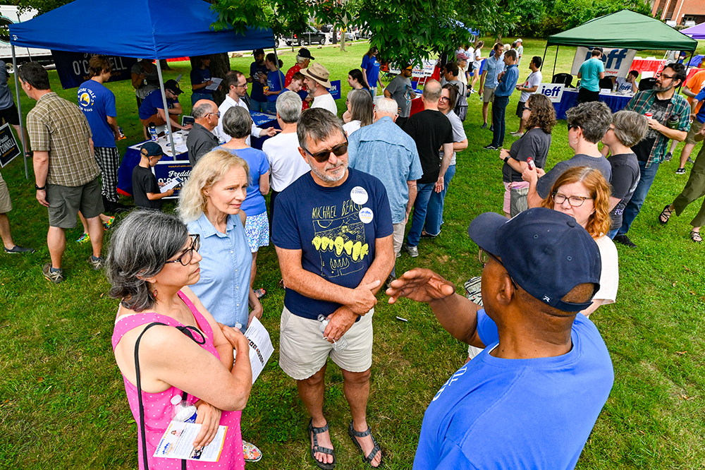 community members socializing at Candidate Meet and Greet in Fannie Mae Dees Park