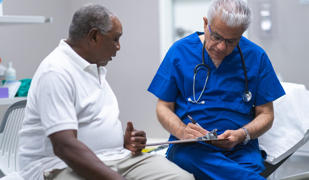 Doctor talking with patient
