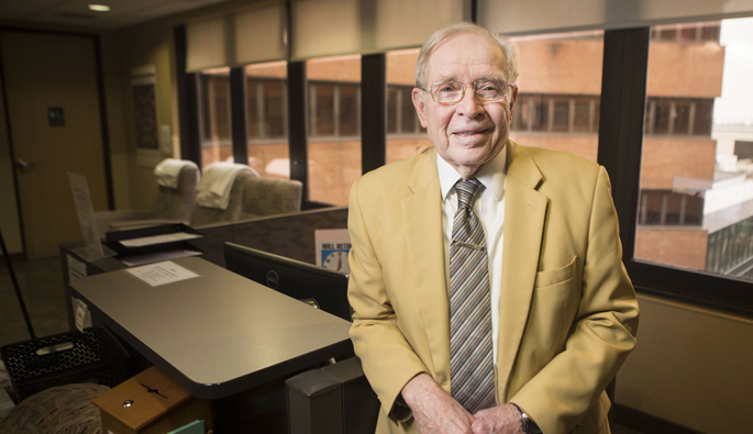 Guest Services volunteer Don Pierce helps family and friends of patients in the Trauma Intensive Care Unit.