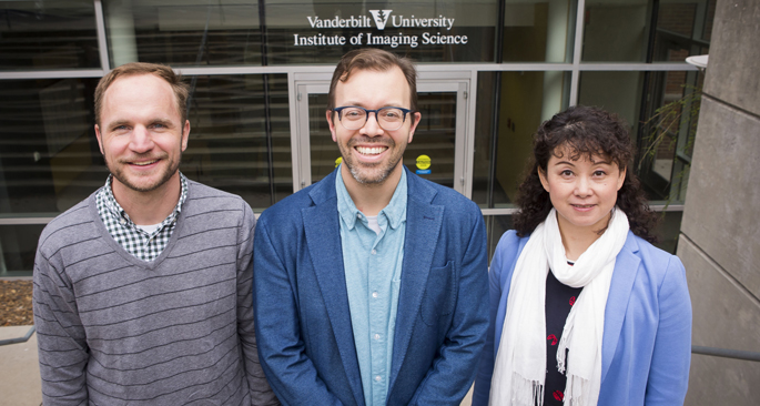 Researchers developing a focused ultrasound neuromodulation device for treating chronic pain include, from left, Charles Caskey, PhD, William Grissom, PhD, and Li Min Chen, MD, PhD.