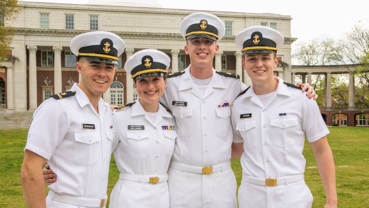 Jacob Hardy, naval ROTC student, overseeing rehearsals for birthday ball at student rec center, walking across campus and going to class at NROTC unit.