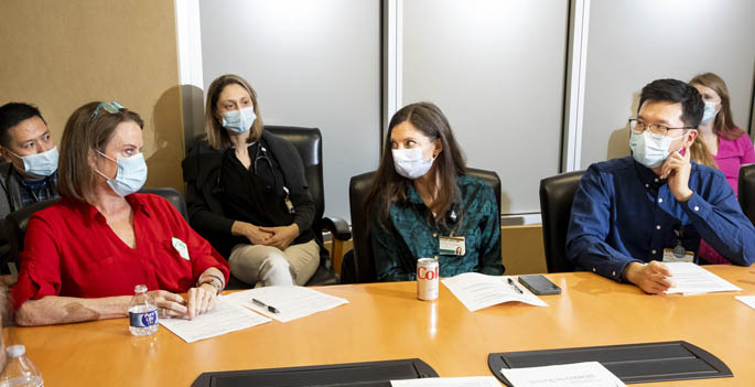 Participants in a recent shared medical appointment include, front row from left, patient Ellen Nelson, Merranda Holmes, MD, and Kevin Liu, MD, Hospice and Palliative Medicine fellow. Back row from left, Francis Balucan, MD, MBA, Taina Ovchinnikov, APRN, F-NP, and Erica Gray, PharmD.