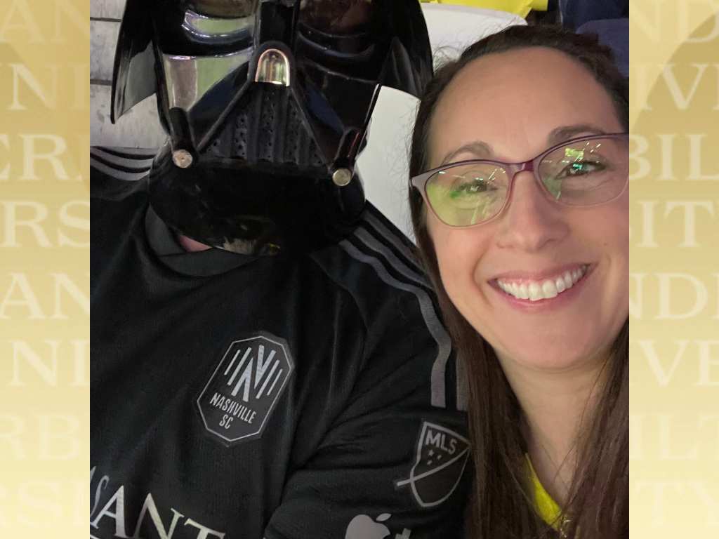 Elana Milano, right, poses next to Darth Vader.