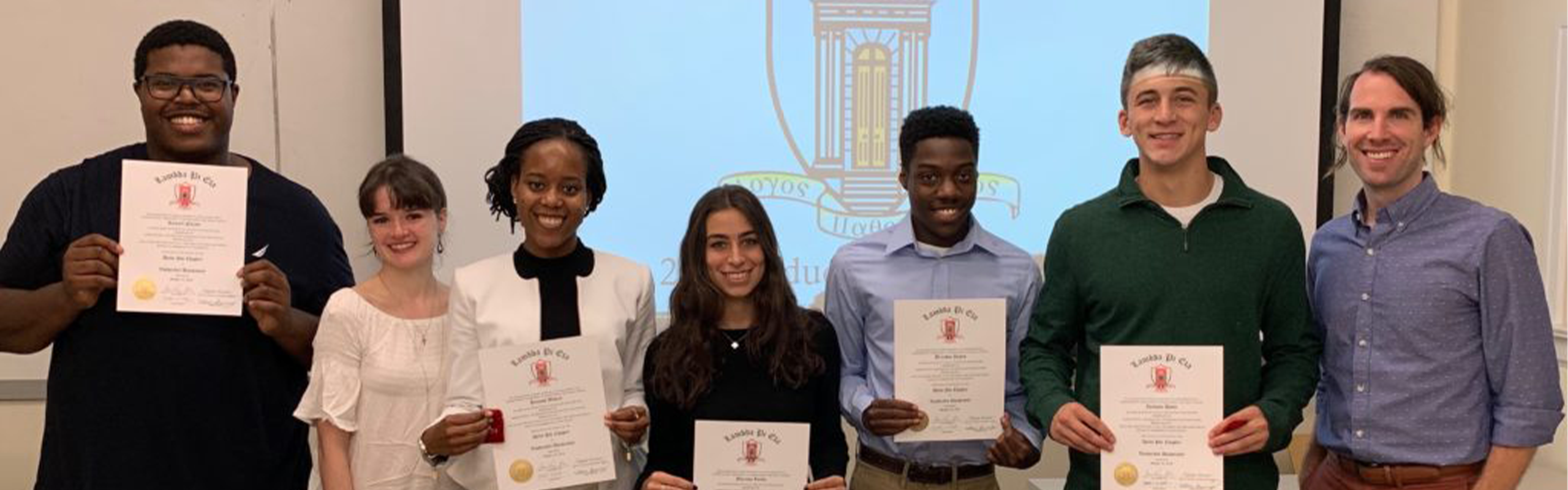 Students with Dustin Wood holding up certifricates
