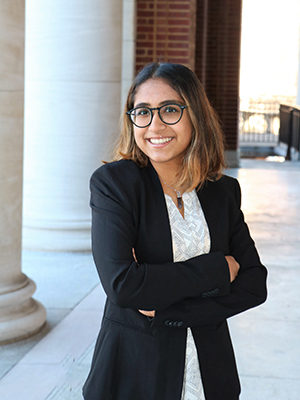 Navya Thakkar standing in a portico