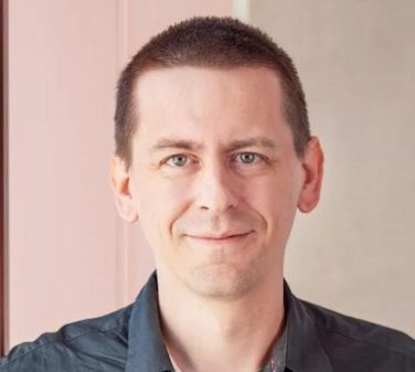 headshot of John Jumper