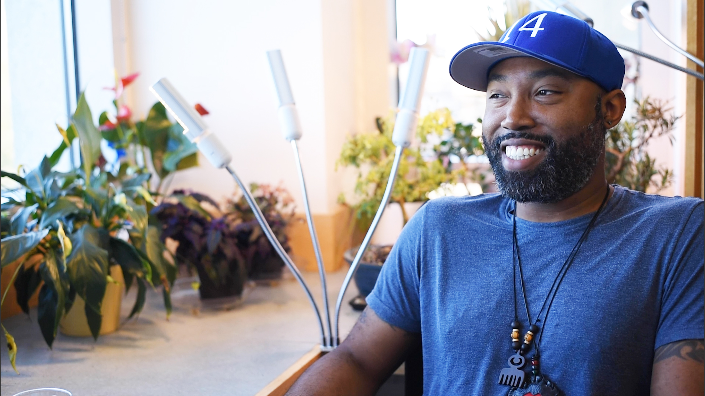 Steve Townsend in his office with plants