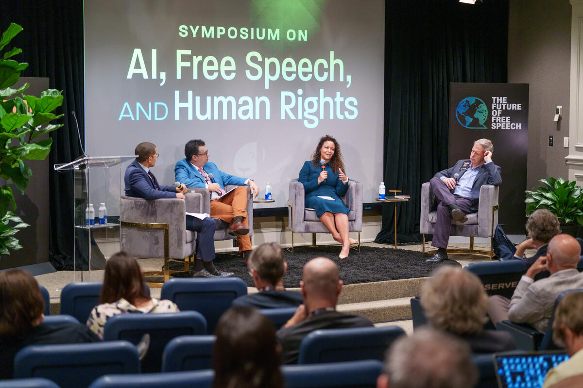 panelists on a stage