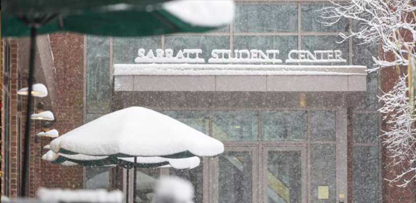 A photo of the entrance to Sarratt on a snowy day