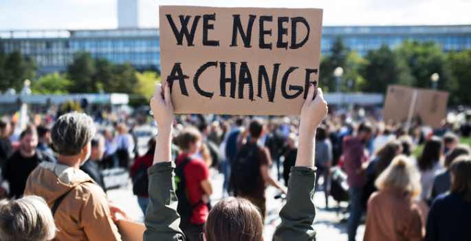 Divinity School faculty reimagines economic structures through a Christian lens