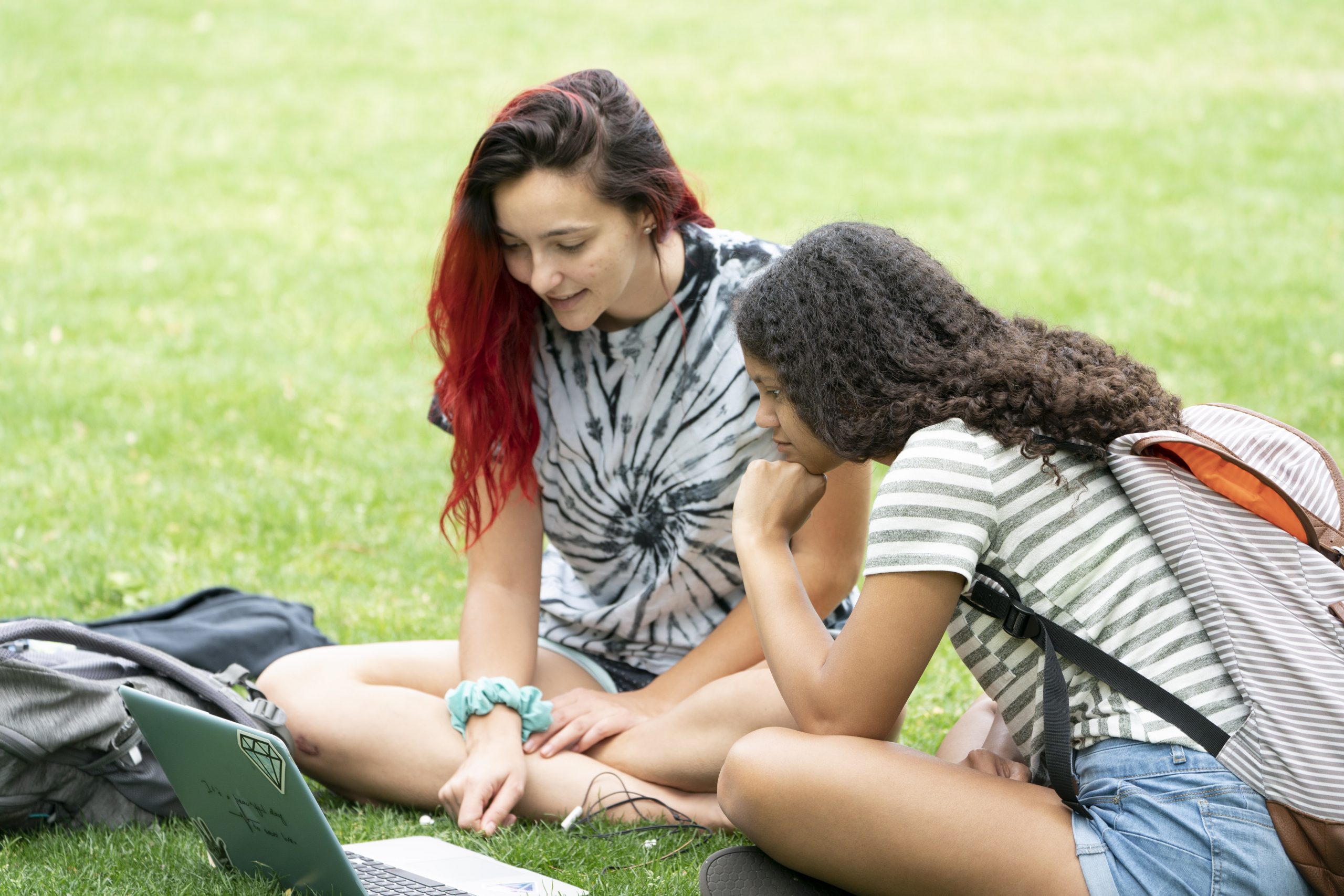 students looking at a laptop