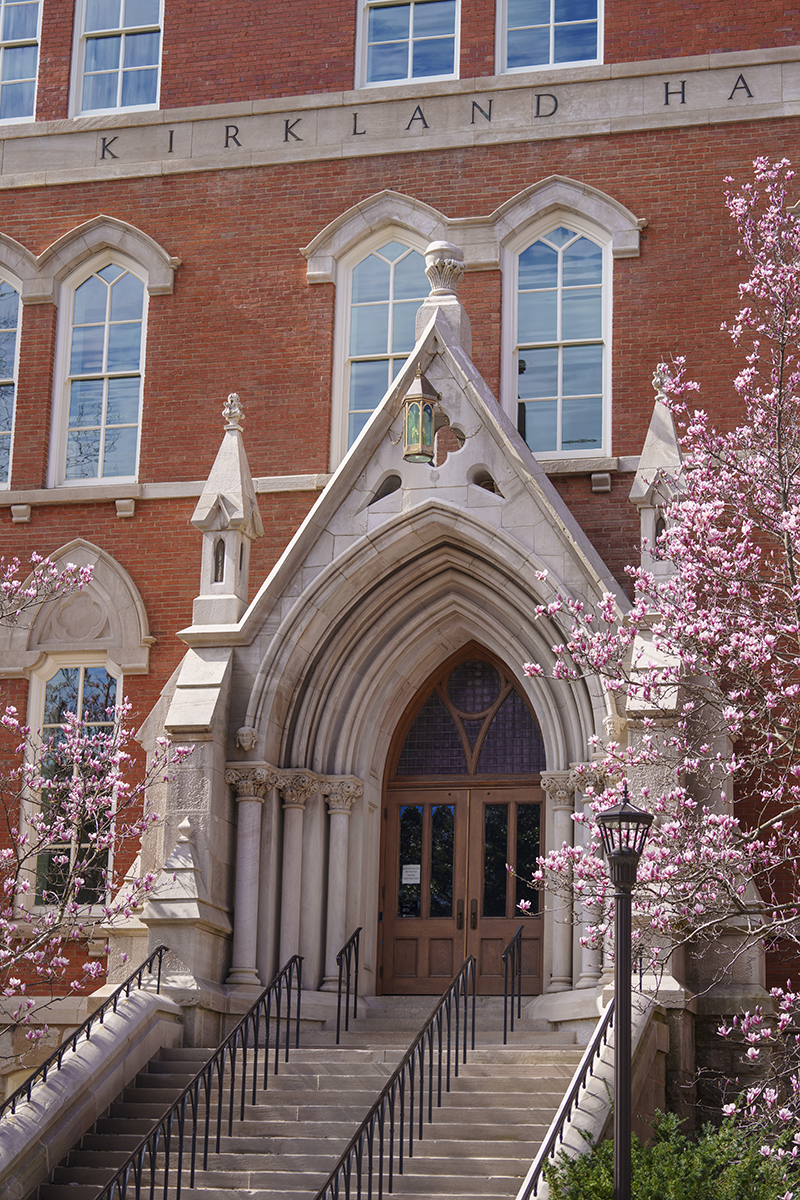 Kirkland Hall and the blooming tulip trees in early March 2024