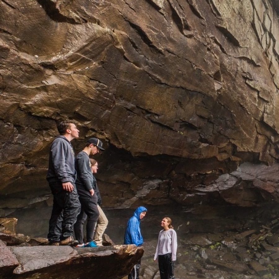 Exploring a waterfall.