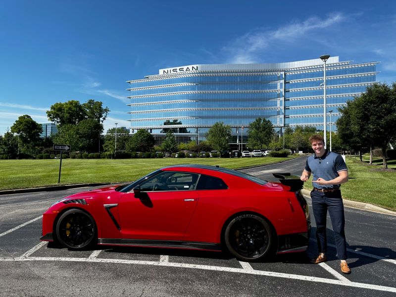 A student with a Nissan car