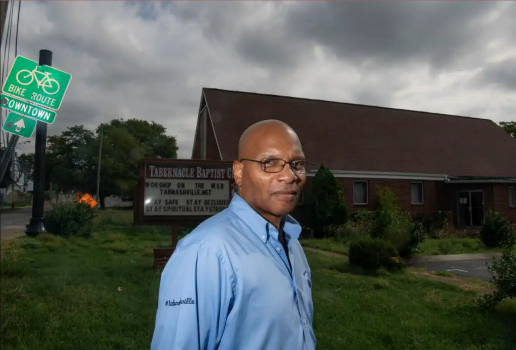 Pastor Darin Freeman of Tabernacle Baptist Church walks around the old property which recently sold at 2214 12 Avenue South in Nashville , Tenn., Tuesday, July 19, 2022. Two years ago the church moved to 6801 Charlotte Pike. NICOLE HESTER / THE TENNESSEAN