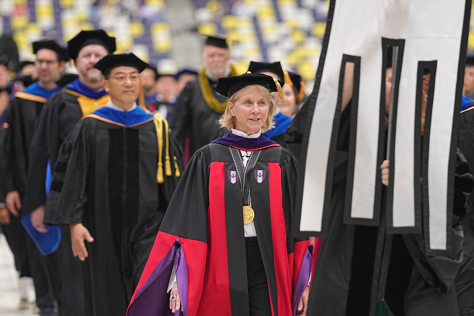 Faculty and emeriti faculty process during Vanderbilt University's 2025 Commencement ceremony at GEODIS Park