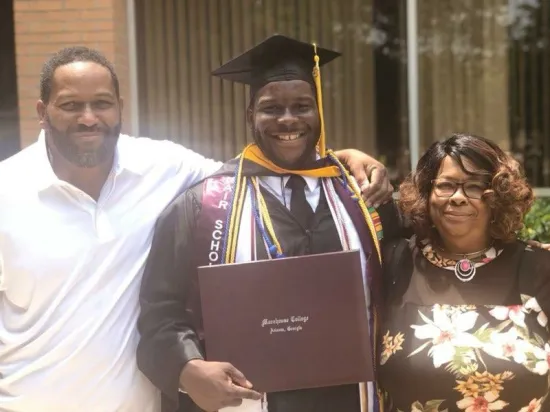 Logan Northcutt and his parents after his graduation from Morehouse College (Submitted photo)