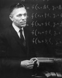 image of Baylis Shanks standing in front of chalkboard