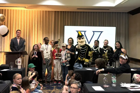 Mr. Commodore and Vanderbilt Cheer at the read-a-thon closing ceremony.