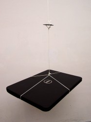 laptop hanging from a chip