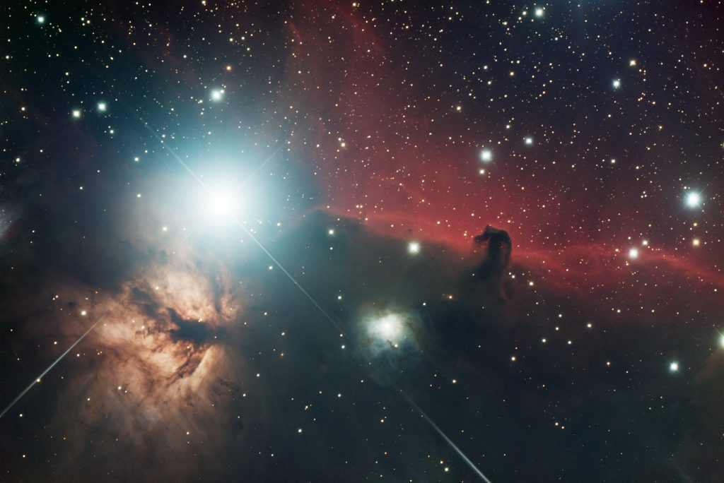 Astrophotograph of Orion's belt, Horsehead Nebula, Flame Nebula, and NGC 2023, taken from Dyer Observatory under 12-hour exposure.