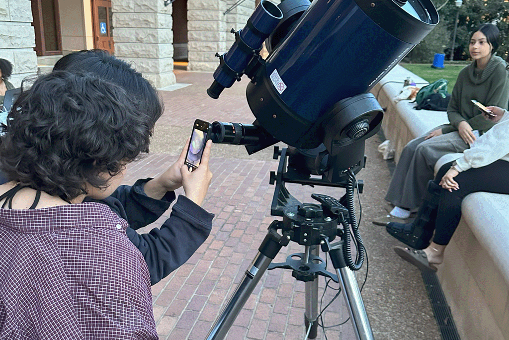 Students capture photos of the moon through a telescope