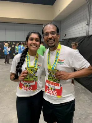 Sanjana and her dad have run half marathons together. This is from their first. (Submitted photo)