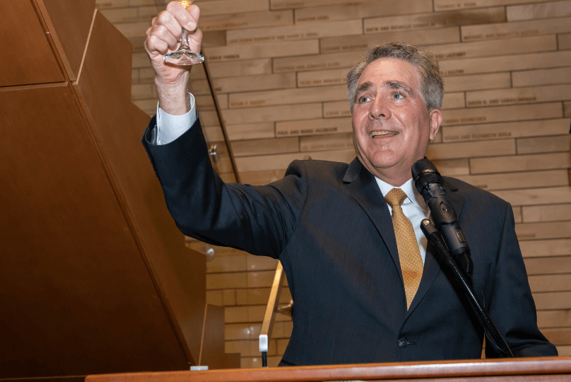 Dean Johnson Toasts Management Hall