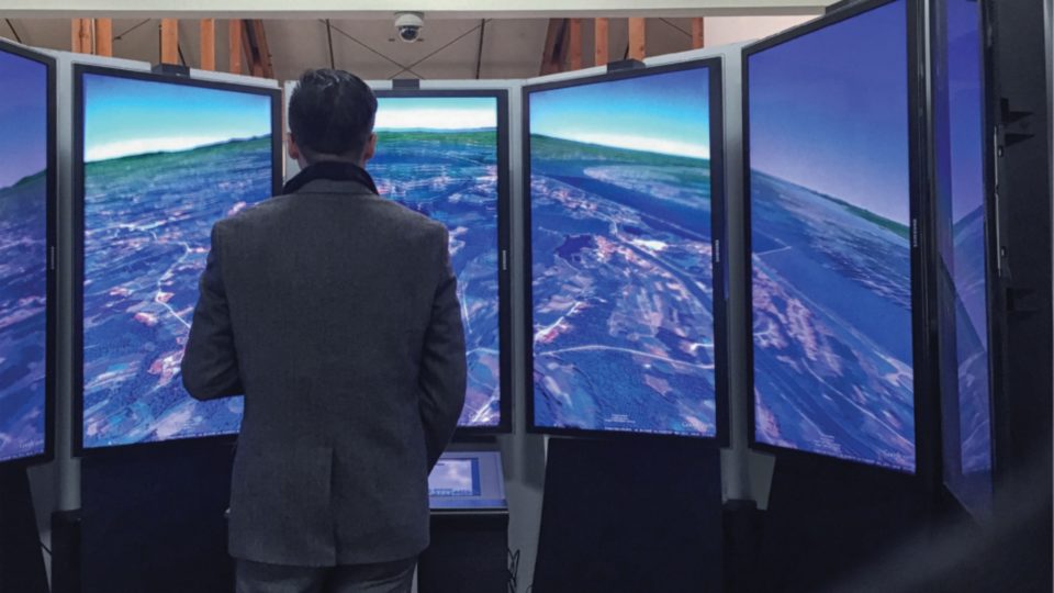 First-year MBA Winston Ling views Earth from an outer space point of view while visiting Google headquarters in Mountain View, California. “Googlers” can spend 20 percent of their time working on side projects related to the business. One of Google’s engineers created the viewing booth—an interactive toy essentially—so people could use it to go around the Earth from space. Google’s Heather Webb, MBA’07, hosted the Vanderbilt visit. Photo Credit: Samantha Levine