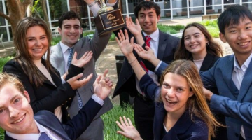 Pictured: Vanderbilt Business Accelerator Summer Business Immersion students from the 2025 program pose with the trophy