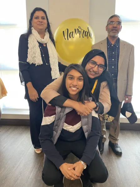 Ajmal and her family during the Outstanding Senior ceremony (Submitted photo)