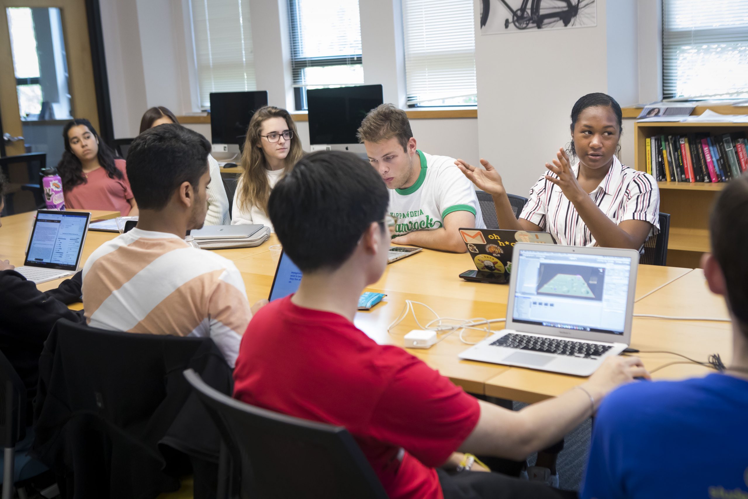 Students and professors collaborating.