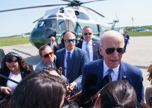 President Biden speaks to a group of reporters.