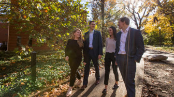 Students in the Vanderbilt MS Finance program develop strong friendships with classmates during their time at Owen. This image shows 4 classmates walking on campus.