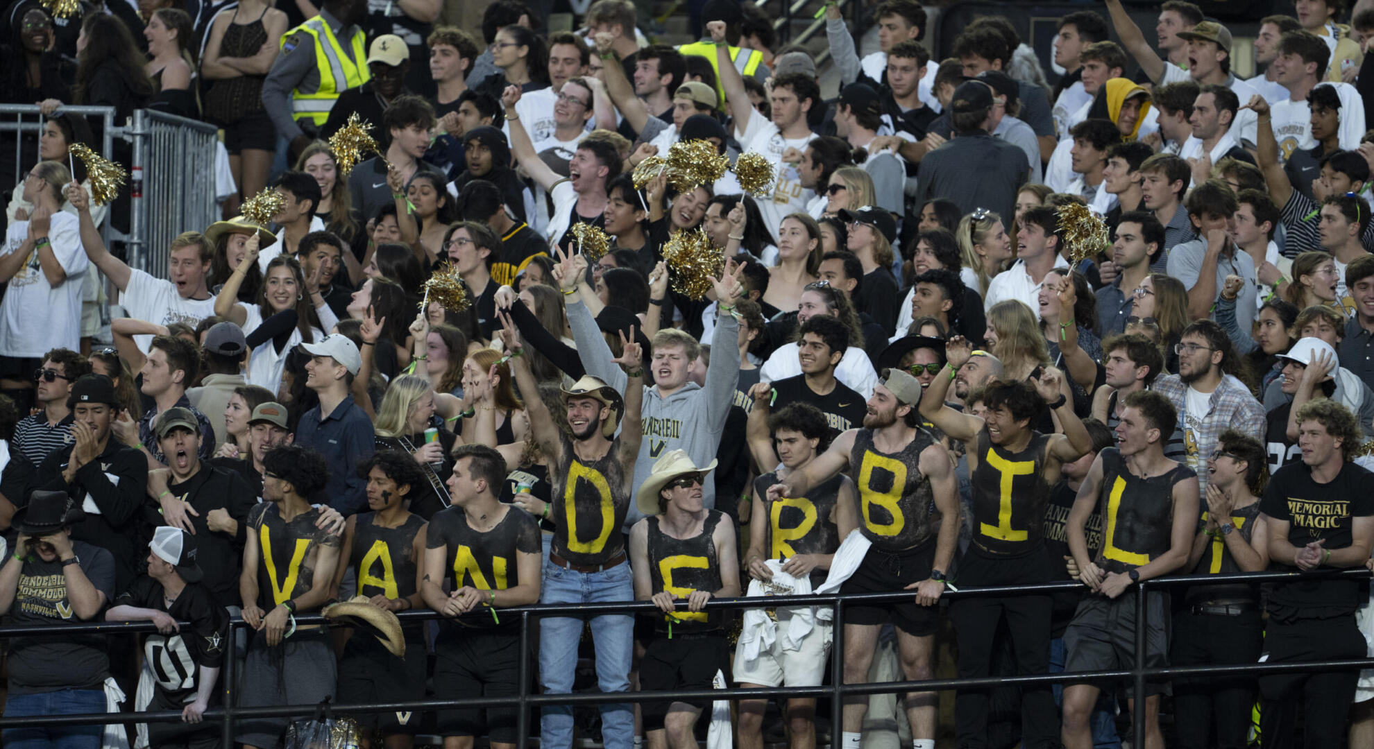 The student section cheers on Vanderbilt football. 